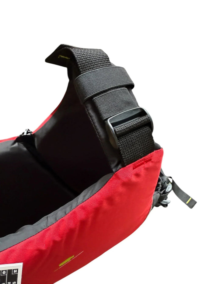Yak Kallista 50N red buoyancy aid with adjustable black shoulder strap, close-up view