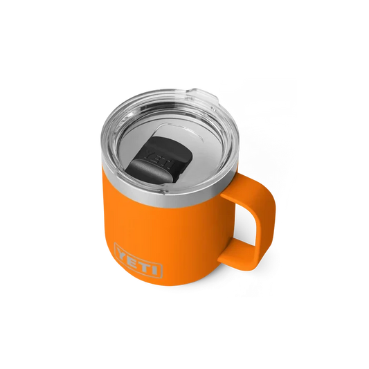 Orange YETI insulated mug with handle and clear lid, ideal for watersports adventures in Whitstable
