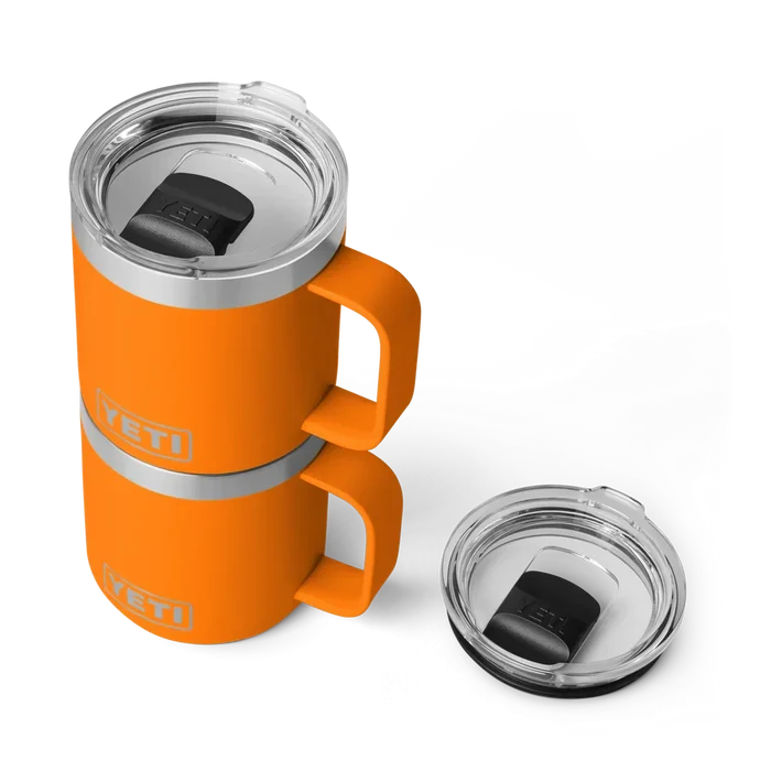 Orange YETI insulated travel mug with handle and clear lid, ideal for watersports adventures.